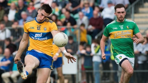 Jamie Malone kicks a point for a dominant Clare