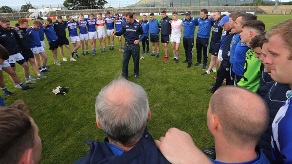 Laois manager John Sugrue speaks to his players after their win against Derry. They are in this morning's round-three draw.