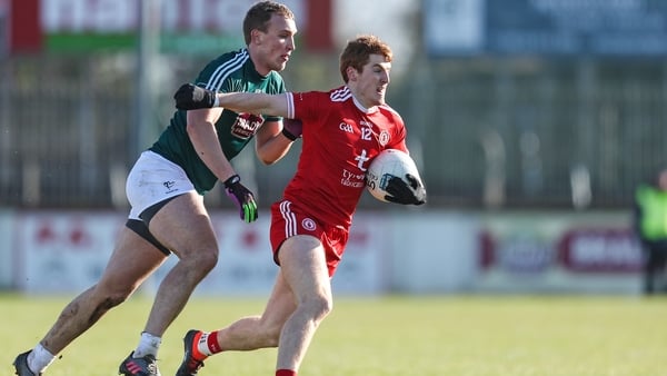 Tyrone's Peter Harte breaks clear of Kildare's Tommy Moolick during a League encounter last year