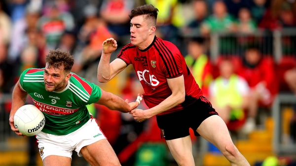 Down's Owen McCabe up against Mayo's Aidan O'Shea during last weekend's round 2 qualifier in Newry