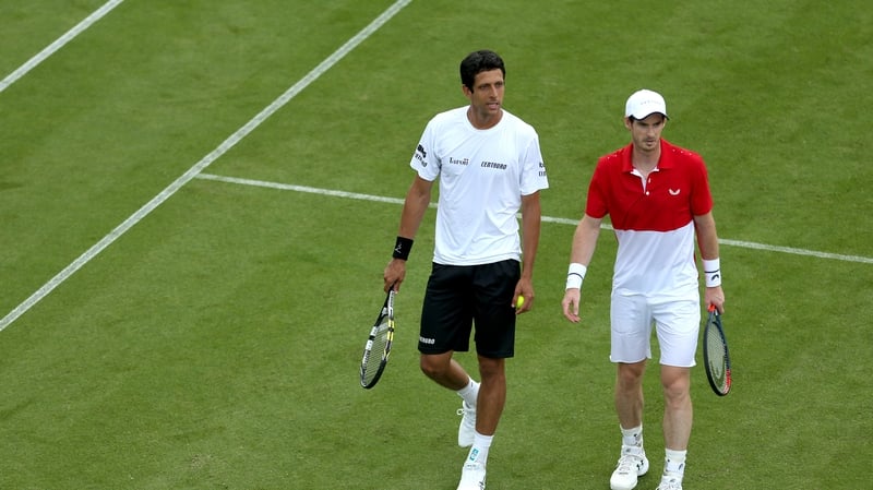 Andy Murray with Marcelo Melo after their loss