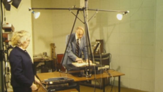 Mormon genealogists microfilming church records, Knock Communications Centre (1984)