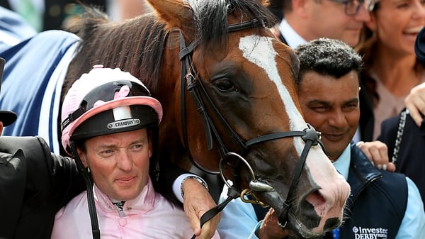 Seamie Heffernan celebrates winning the Investec Derby Stakes with Anthony Van Dyck