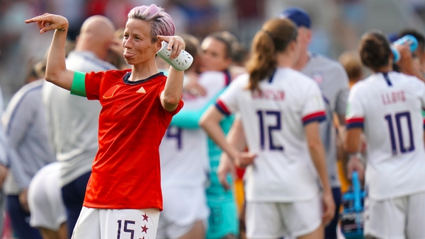 Megan Rapinoe celebrates after her side beat Spain in the round of 16