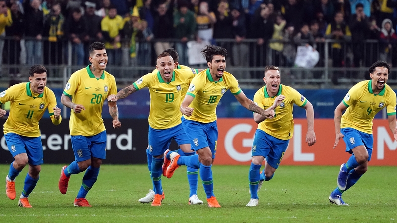 Brazil celebrate winning the penalty shoot-out following