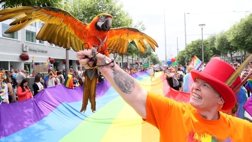Barbara Doyle, from Coolock, with her macaw Quinn