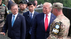 Donald Trump tours the Demilitarised Zone alongside Moon Jae-in