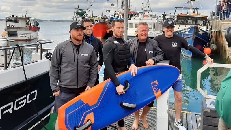 Kite surfer Eoghan Quinn together with his support team from the Camila E (Pic: Peter O'Shea)
