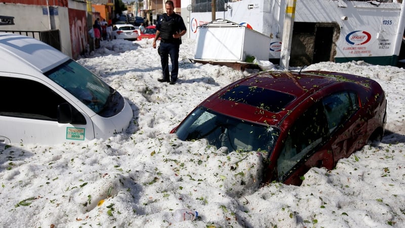 Dozens of vehicles were buried in the ice in Guadalajara