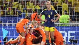 Dutch players celebrate at the final whistle