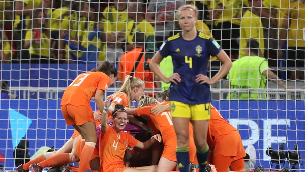Dutch players celebrate at the final whistle