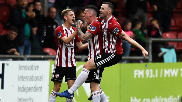 David Parkhouse, centre, celebrates his goal for Derry