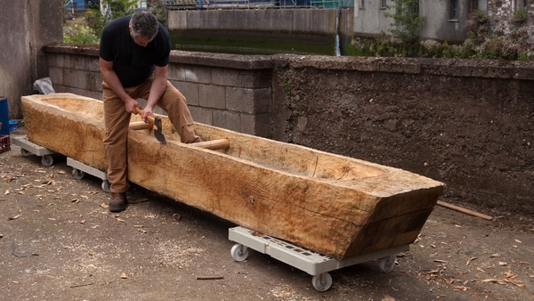 Mark Griffiths working on the replica log boat