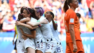 The USA players celebrate Rose Lavelle's super strike to seal the victory