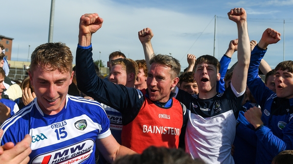 Brennan celebrates with his players