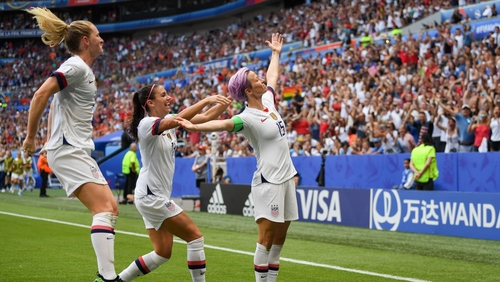 Megan Rapinoe celebrates following her World Cup final opener in Lyon