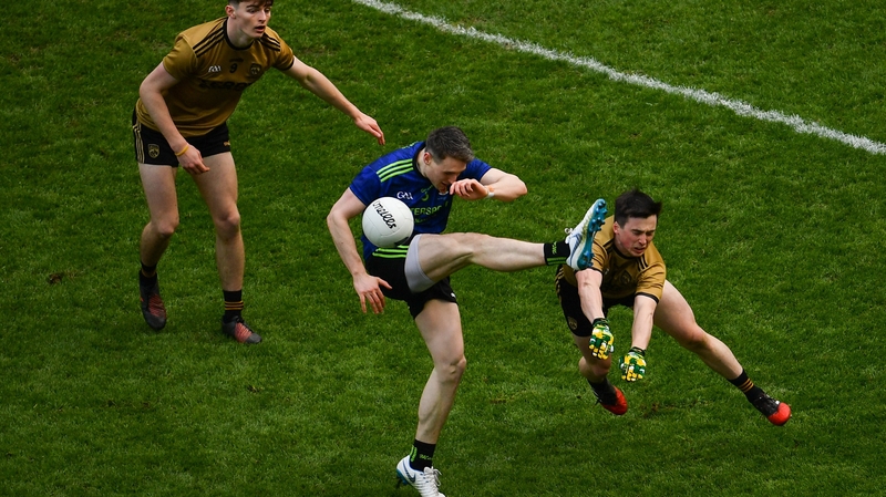 Paddy Durcan of Mayo has a shot charged down by Kerry's Paul Murphy