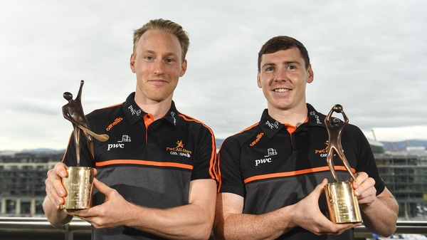 O'Keeffe and Brennan with their awards
