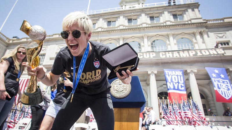 Rapinoe celebrating at the ticker tape parade