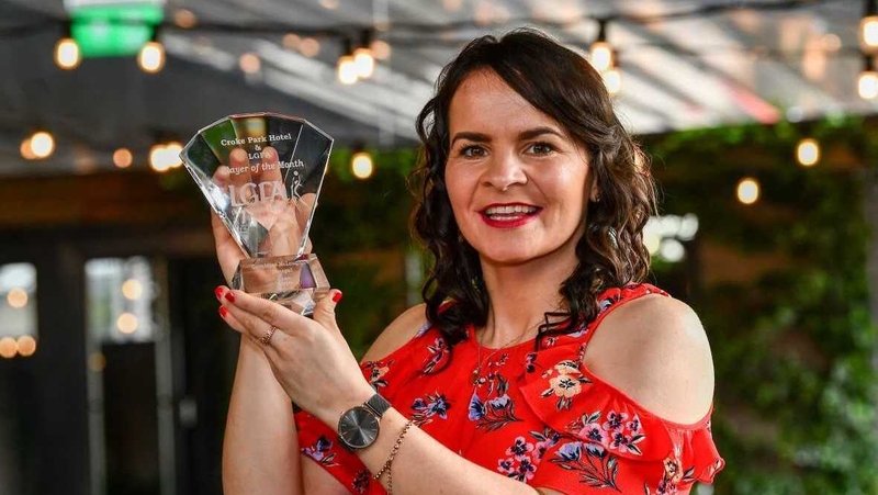 Geraldine McLaughlin pictured with her award