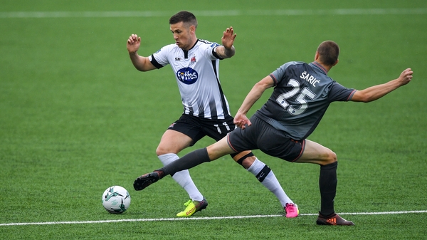 Dundalk's Patrick McEleney in action against Tomislav Saric of Riga