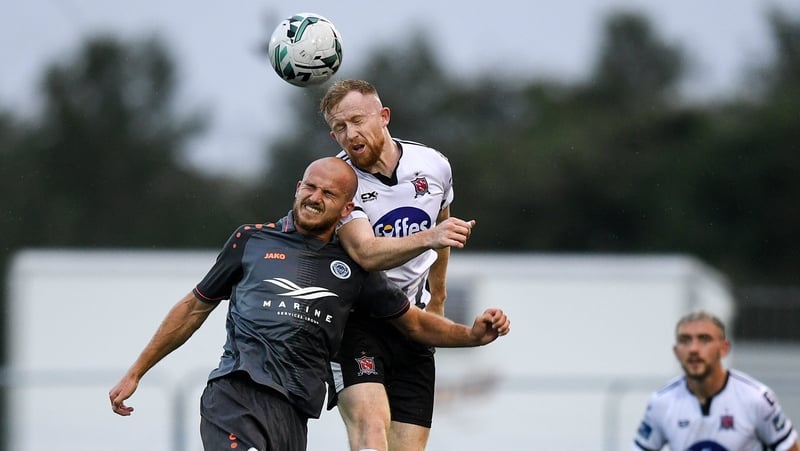 Seán Hoare of Dundalk in action against Roman Debelko of Riga