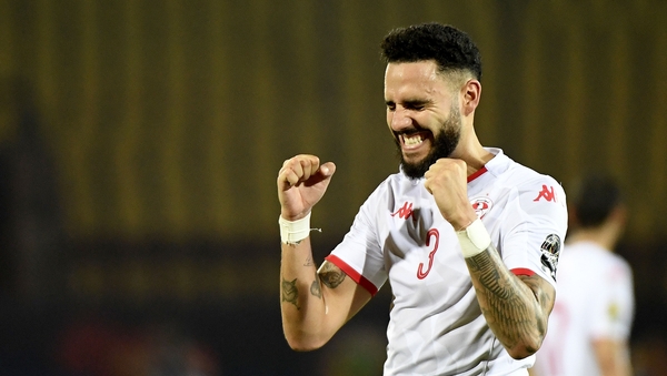 Tunisia's defender Dylan Bronn celebrates at the full-time whistle