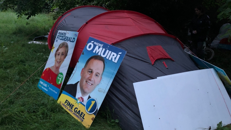 Christine and Derek use election posters as extra bedding and 'walls' for their tent