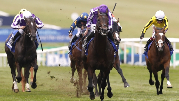 Ten Sovereigns and Ryan Moore (centre) on their way to victory in the Darley July Cup Stakes