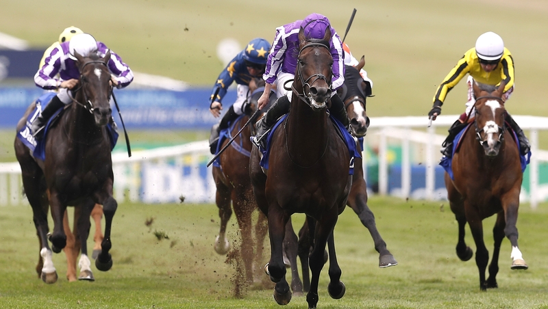 Ten Sovereigns and Ryan Moore (centre) on their way to victory in the Darley July Cup Stakes