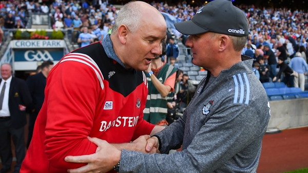 The managers share a word after the game