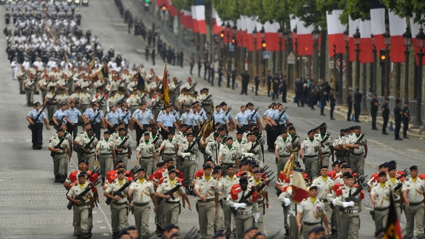 French soldiers take part in the Bastille Day military parade down the Champs-Elysees avenue in Paris