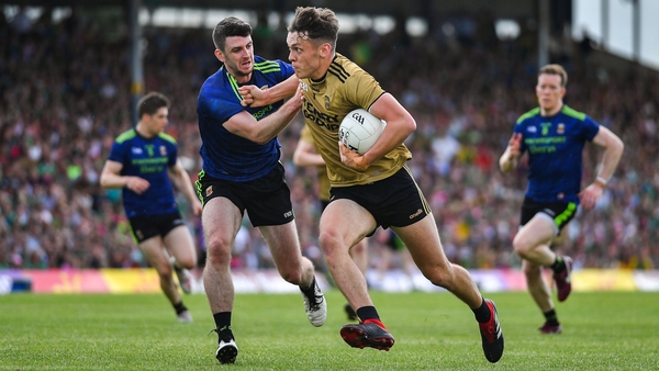 David Clifford of Kerry is challenged by Brendan Harrison