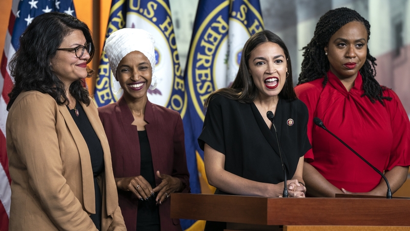 Alexandria Ocasio-Cortez speaks to the media accompanied by Rashida Tlaib, Ilhan Omar and Ayanna Pressley