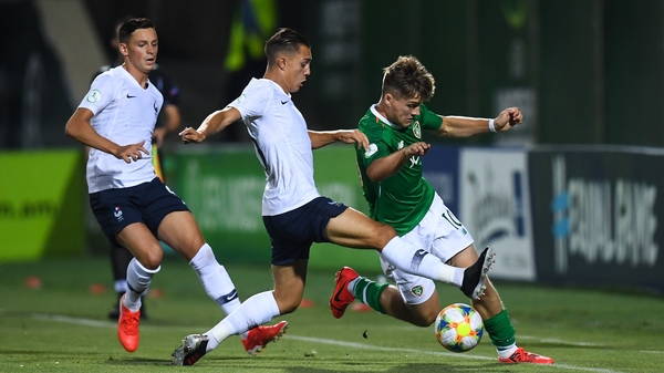 Matt Everitt of the Republic of Ireland in action against Maxence Caqueret