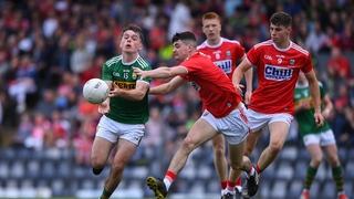 Killian Falvey of Kerry in action against Michael O'Mahony of Cork