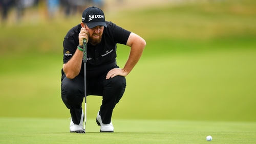 Shane Lowry shares the lead at The Open