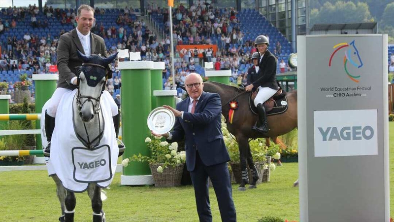 Cian O'Connor celebrates