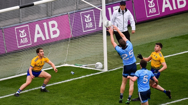 Dean Rock palms the ball to the back of the Roscommon net
