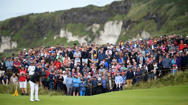 The crowds look on during the first round of the Open Championship
