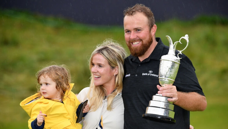 Shane Lowry celebrates victory with wife Wendy and daughter Iris