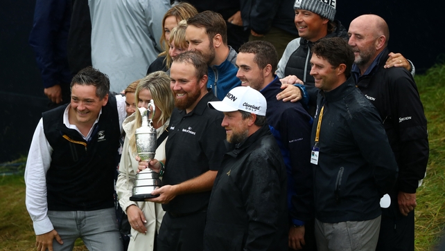 Lowry flanked by his team at Royal Portrush