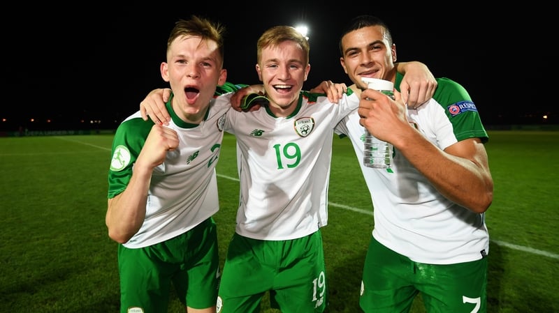 Andy Lyons, left, Brandon Kavanagh and Ali Reghba celebrate the 2-1 win over Czech Republic