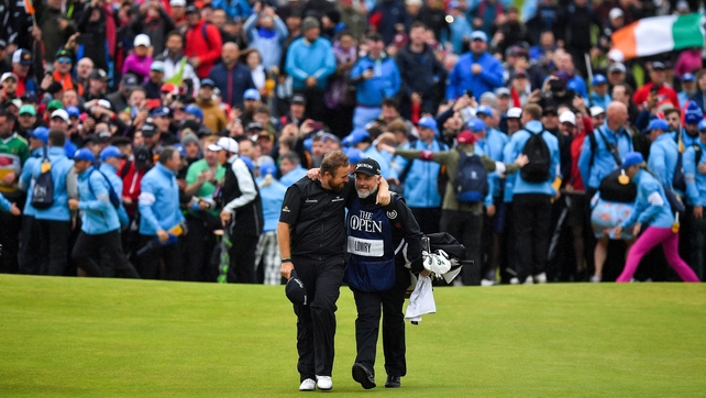 Shane Lowry and Bo Martin share a moment on the 18th green