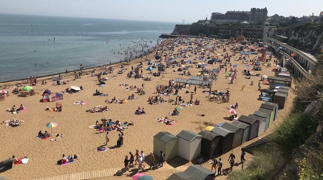 In the UK, crowds flocked to the beach to enjoy the good weather