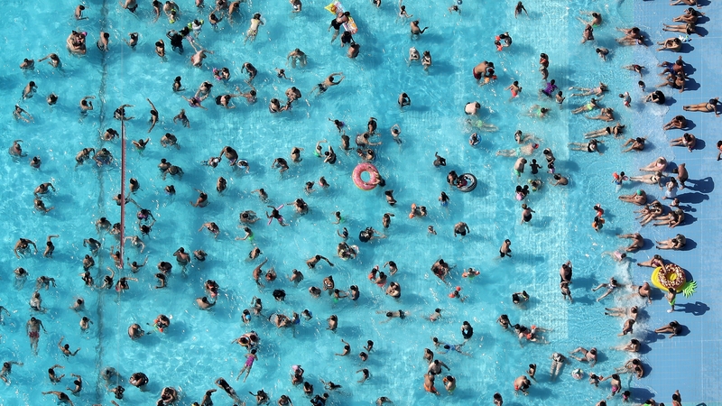 People cool down on a hot July day in Germany last year