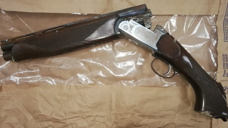 The shotgub abd two used cartridges were recovered at the scene