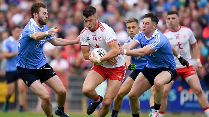 Richard Donnelly of Tyrone in action against Jack McCaffrey, and Philly McMahon during last year's Super 8s clash