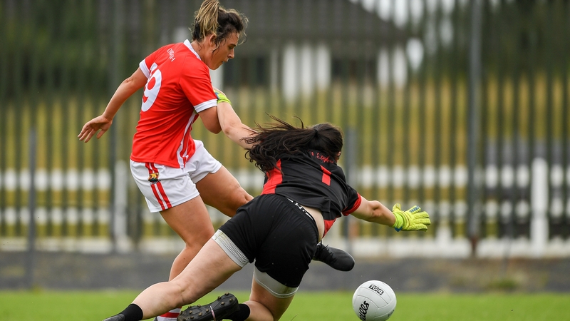 Doireannn O'Sullivan shoots past the Tyrone goalkeeper Shannon Lynch