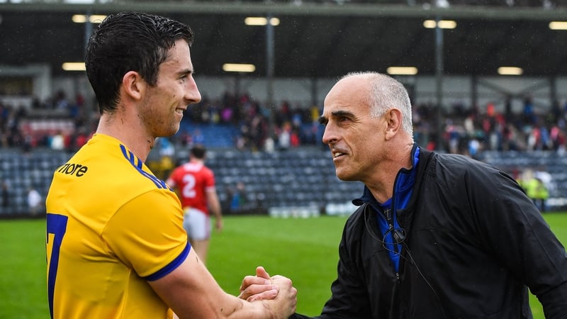 Roscommon manager Anthony Cunningham congratulates Colin Compton after the win over Cork